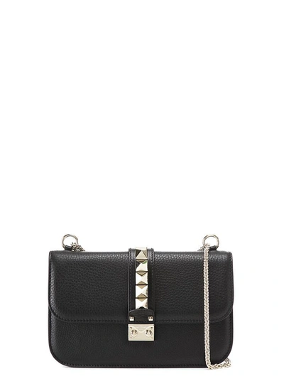 Shop Valentino Rockstud Shoulder Bag In Black