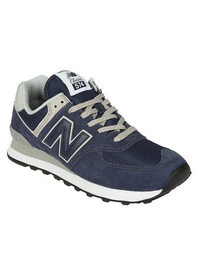Shop New Balance Ml574 Sneakers