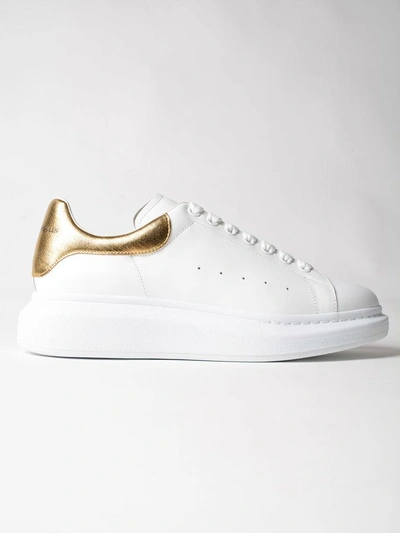 Shop Alexander Mcqueen Leather Sneaker In White-gold