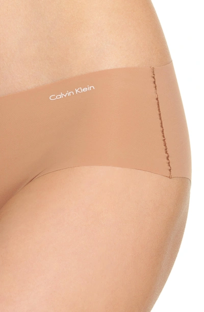 Shop Calvin Klein 'invisibles' Hipster Briefs In Bronzed