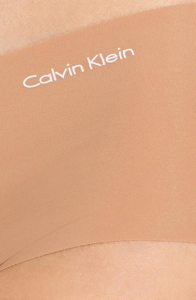 Shop Calvin Klein 'invisibles' Hipster Briefs In Bronzed
