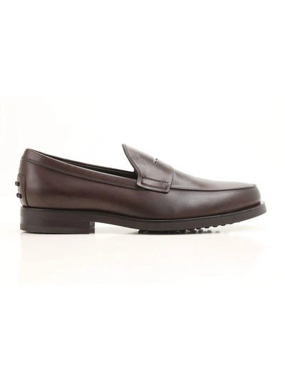 Shop Tod's Penny Bar Detailed Leather Loafers In Brown