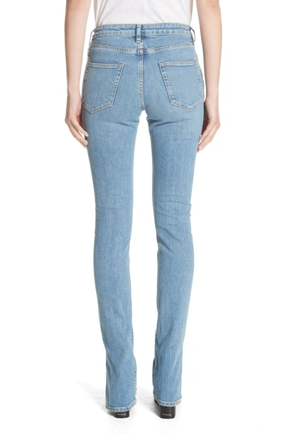 Shop Simon Miller Lowry Split Hem Jeans In Mid Indigo Wash