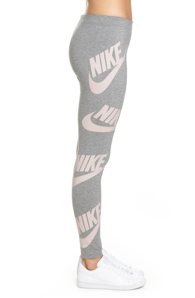 Shop Nike Sportswear Graphic Leggings In Carbon Heather/elemental Rose