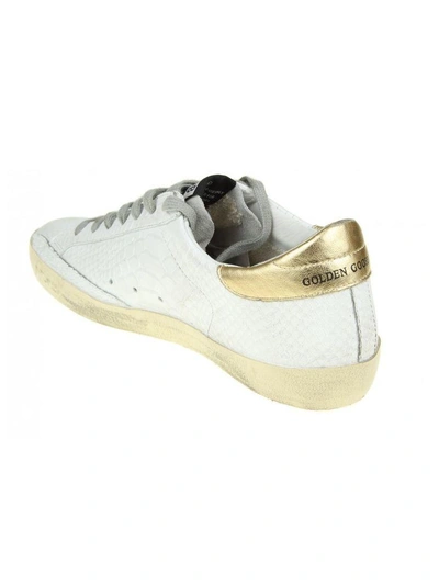 Shop Golden Goose Sneakers Superstar In White Leather And Golden Star