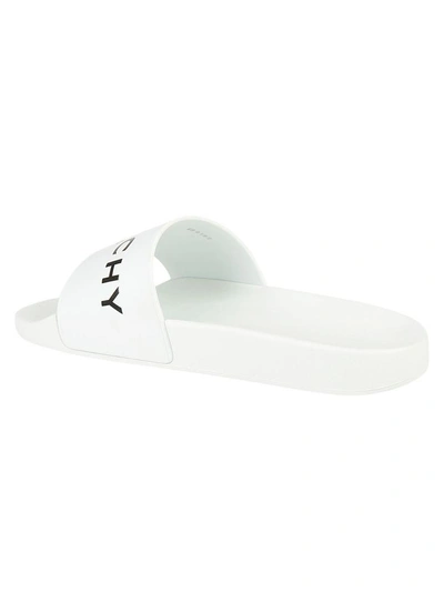 Shop Givenchy Sliders In White