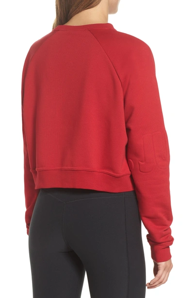 Shop Nike Long Sleeve Crop Training Top In Gym Red/ Black