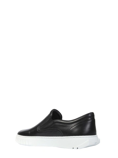 Shop Ferragamo Slip On Sneakers In Nero