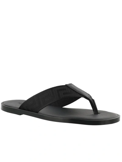 Shop Versace Thong Sandal In Black