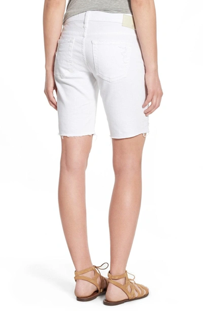 Shop Ag 'nikki' Cutoff Denim Bermuda Shorts In 1 Year White Mended