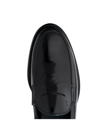 Shop Tod's Brushed Leather Loafers In Black