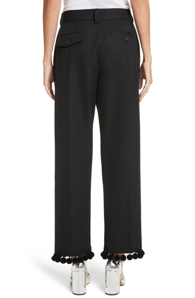 Shop Marc Jacobs Pompom Hem Trousers In Black