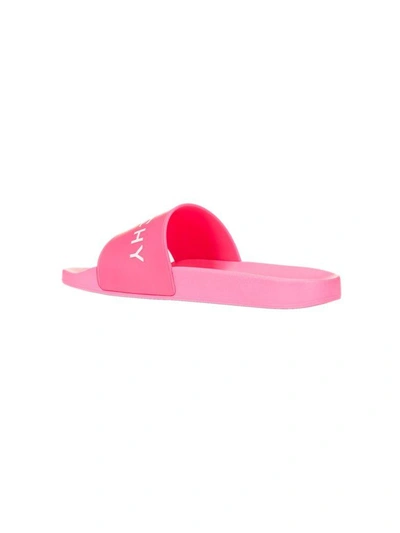 Shop Givenchy Logo Embossed Sliders In Fuxia Fluo