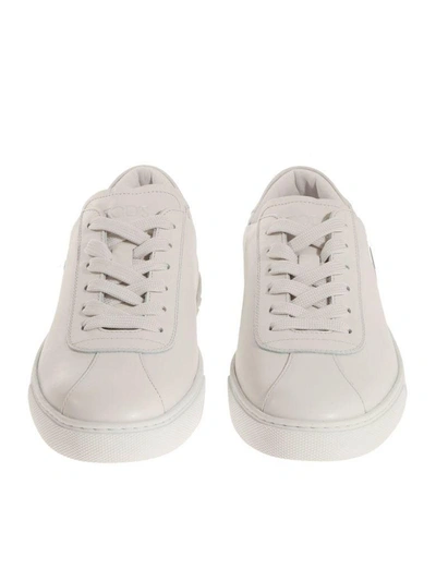 Shop Tod's Logo Sneakers In White