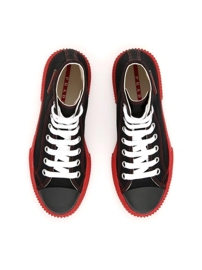 Shop Prada Canvas Hi-top Sneakers In Nero+rossonero