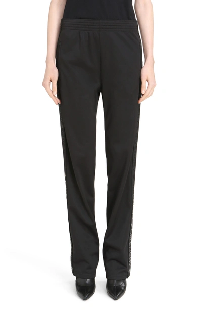 Shop Givenchy Tonal Logo Track Pants In Black