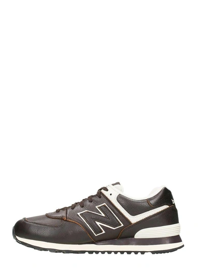 Shop New Balance 574 Brown Leather Sneakers
