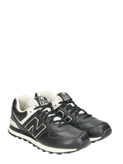 Shop New Balance 574 Black Leather Sneakers