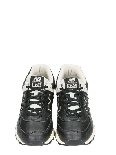 Shop New Balance 574 Black Leather Sneakers