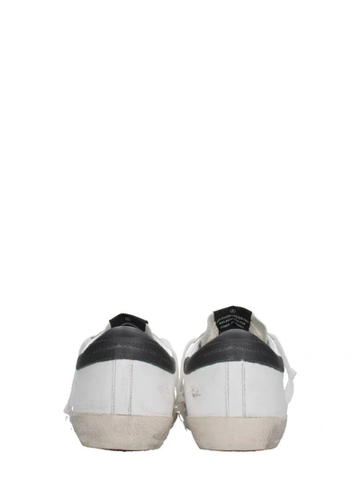 Shop Golden Goose Superstar White Leather Sneakers