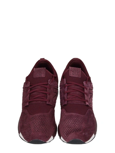 Shop New Balance 247 Bordeaux Suede Sneakers