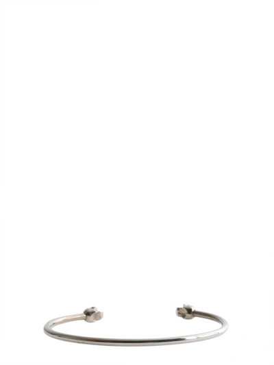 Shop Alexander Mcqueen Twin Skull Bracelet In Argento