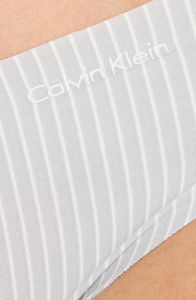 Shop Calvin Klein Invisibles Thong In Parallel Lines Gaze
