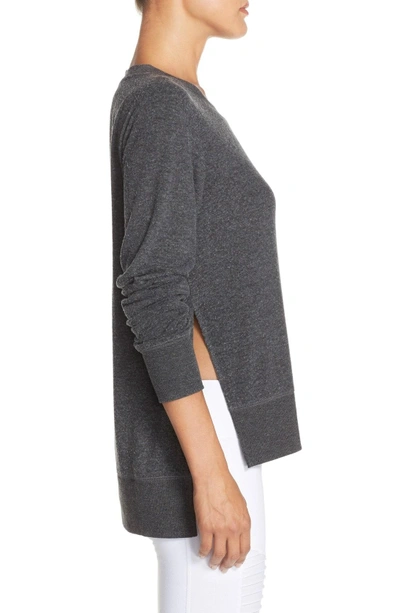 Shop Alo Yoga 'glimpse' Long Sleeve Top In Charcoal Heather