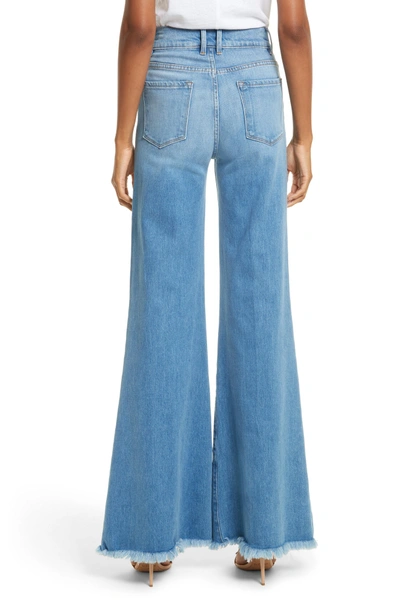 Shop Frame Le Palazzo High Waist Raw Edge Jeans In Opus