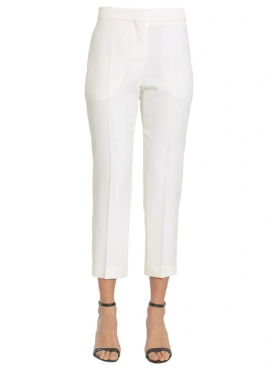 Shop Alexander Mcqueen Cropped Trousers In Avorio