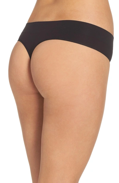 Shop Dkny Litewear Seamless Thong In Black