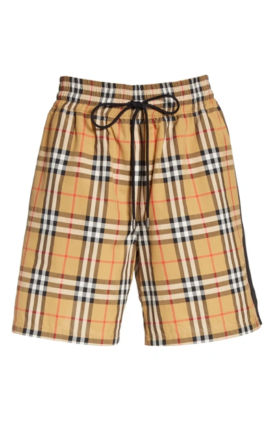 Shop Burberry Dovemoore Cotton Shorts In Antique Yellow