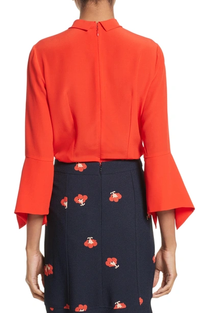 Shop Victoria Beckham Twisted Silk Bell Sleeve Blouse In Red Candy