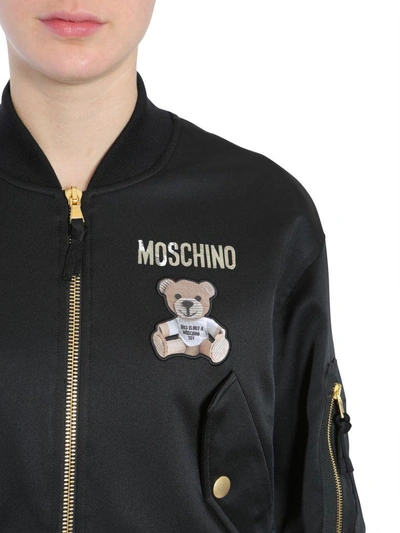 Shop Moschino Satin Bomber Jacket In Nero