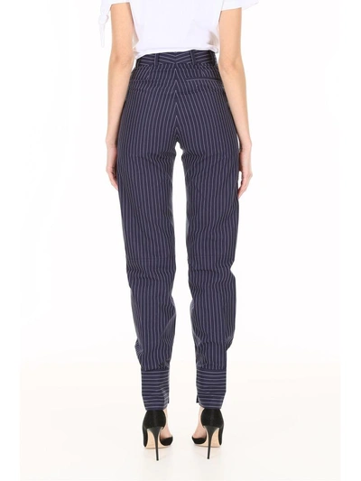 Shop Jw Anderson Pinstriped Cotton Trousers In Navy Off Whiteblu