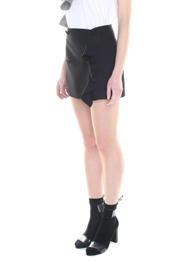 Shop Msgm Ruffle-trimmed Crepe Wrap Mini Skirt In Nero