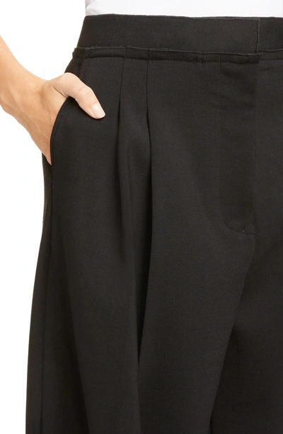 Shop Jw Anderson Wide Leg Trousers In Black