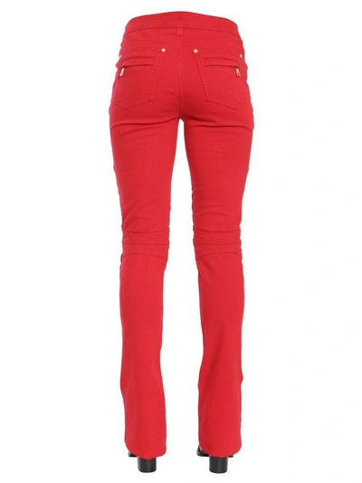 Shop Balmain Flare Biker Trousers In Rosso