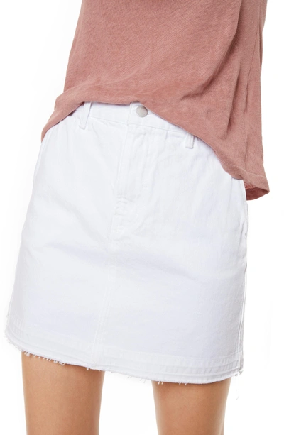 Shop J Brand Bonny Mid Rise Cutoff Denim Miniskirt In White