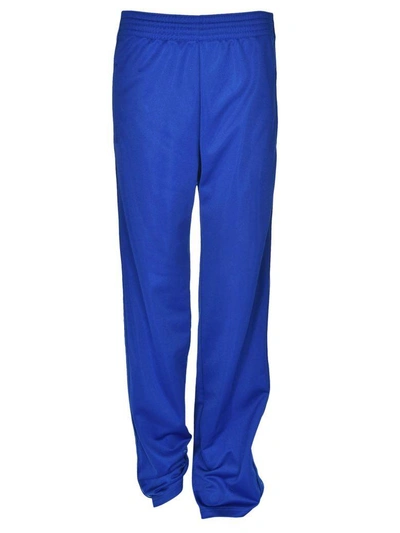 Shop Givenchy Logo Trim Track Pants In Blu