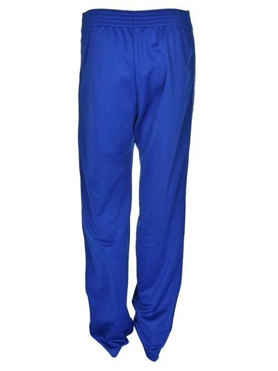 Shop Givenchy Logo Trim Track Pants In Blu