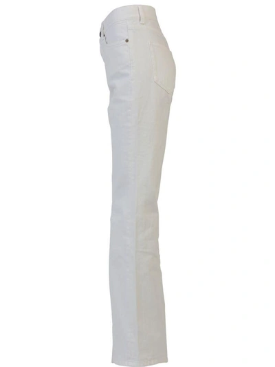 Shop Saint Laurent Cropped Flared Jeans In White