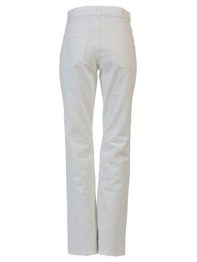 Shop Saint Laurent Cropped Flared Jeans In White