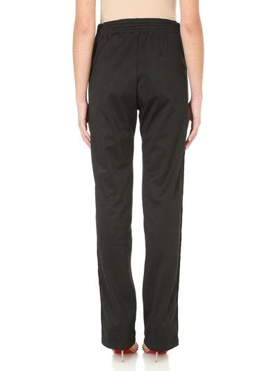 Givenchy Logo Trim Track Pants In Black