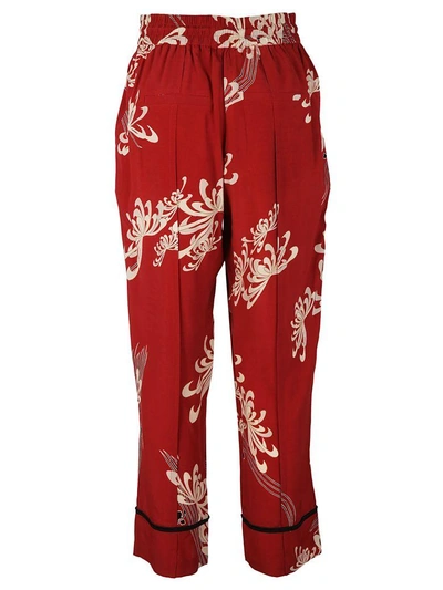 Shop Mcq By Alexander Mcqueen Mcq Alexander Mcqueen Floral Print Trousers In Red