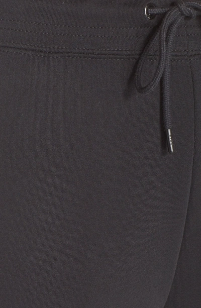 Shop Nike Fleece Sweatpants In Black/ Black