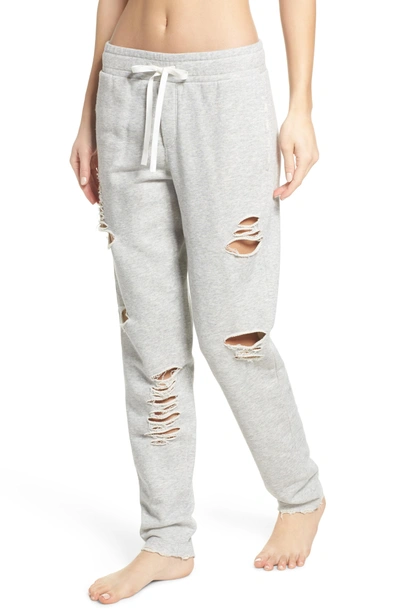 Shop Alo Yoga Ripped Sweatpants In Heather Grey/ Distressed Holes