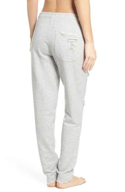 Shop Alo Yoga Ripped Sweatpants In Heather Grey/ Distressed Holes