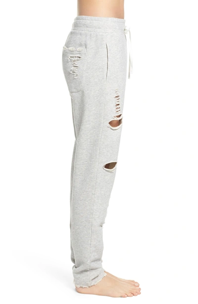 Shop Alo Yoga Ripped Sweatpants In Heather Grey/ Distressed Holes