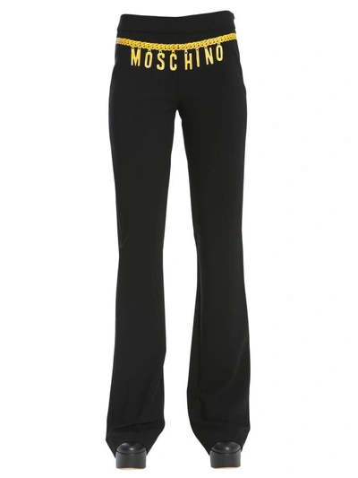 Shop Moschino Chain Belt Printed Trousers In Nero